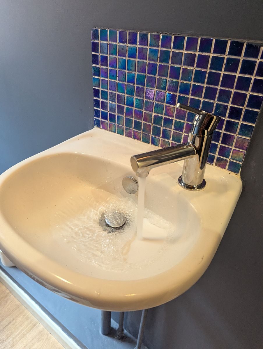 New chrome basin tap fitted and running