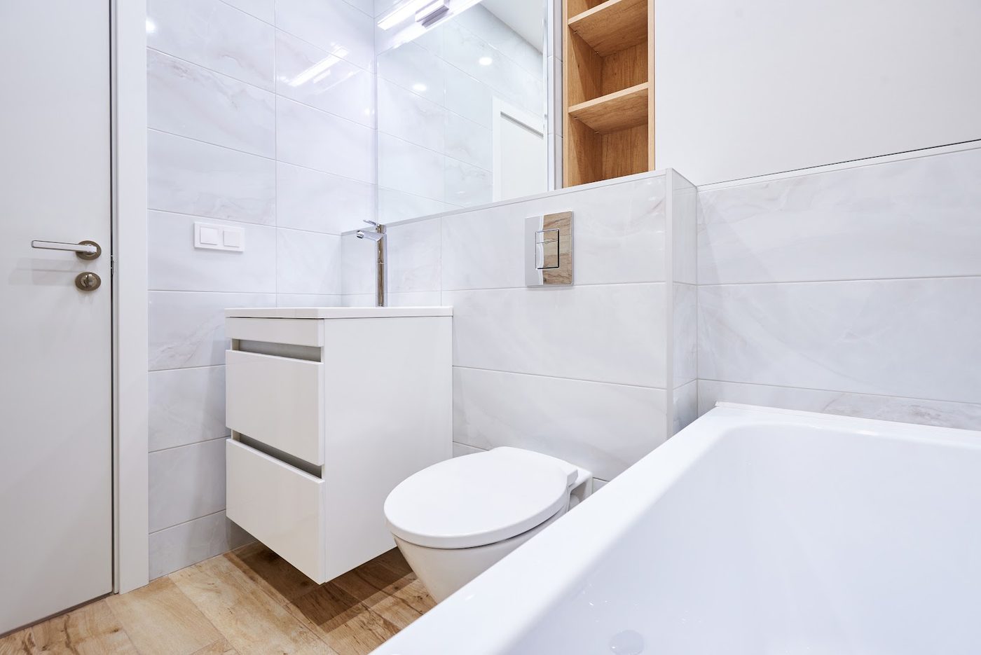 Clean finished bathroom suite with bath and basin unit