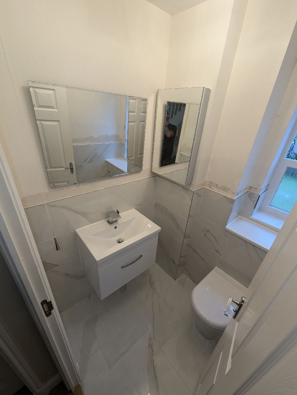 Bathroom vanity unit and mirror after completion