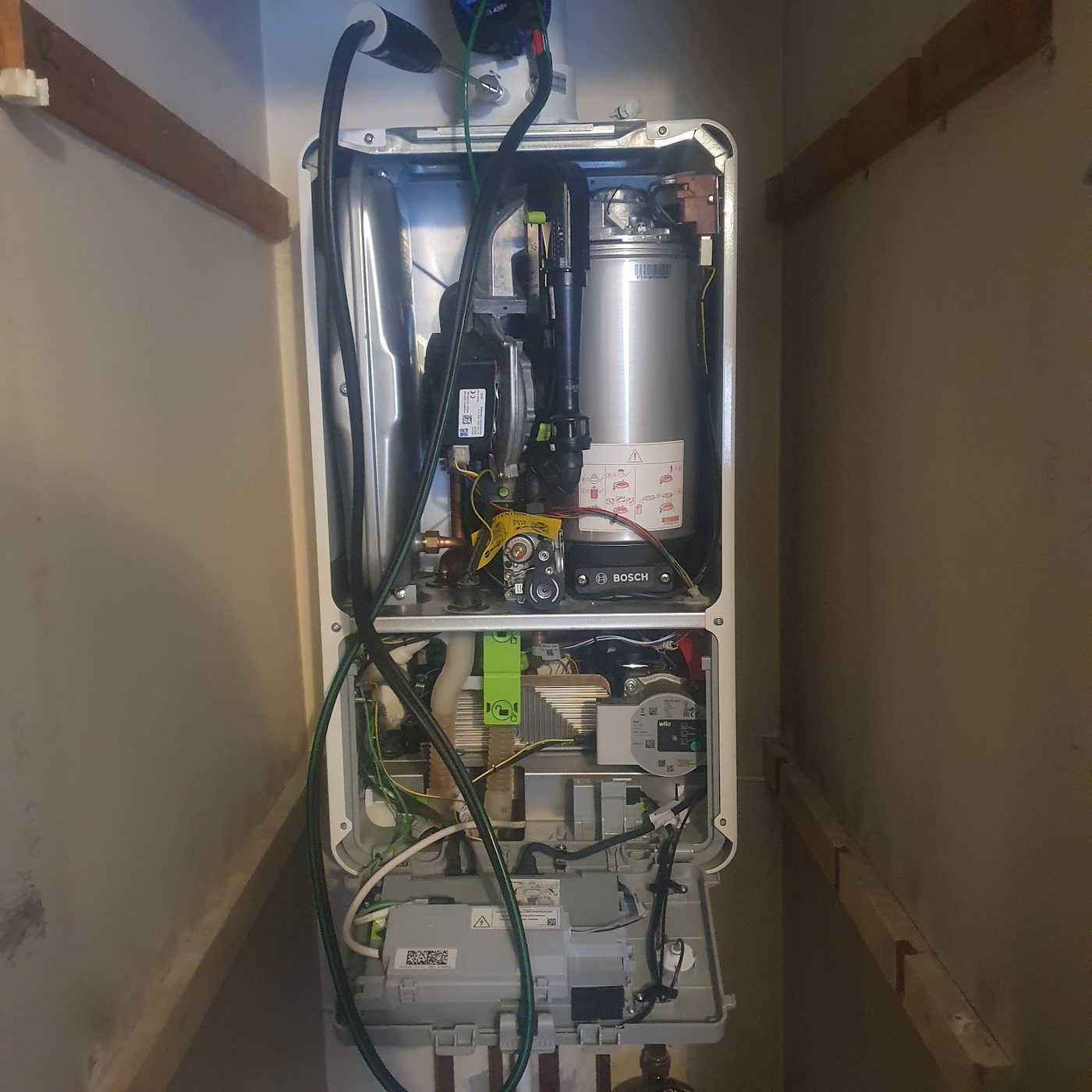Boiler opened up for a full service by a Gas Safe engineer