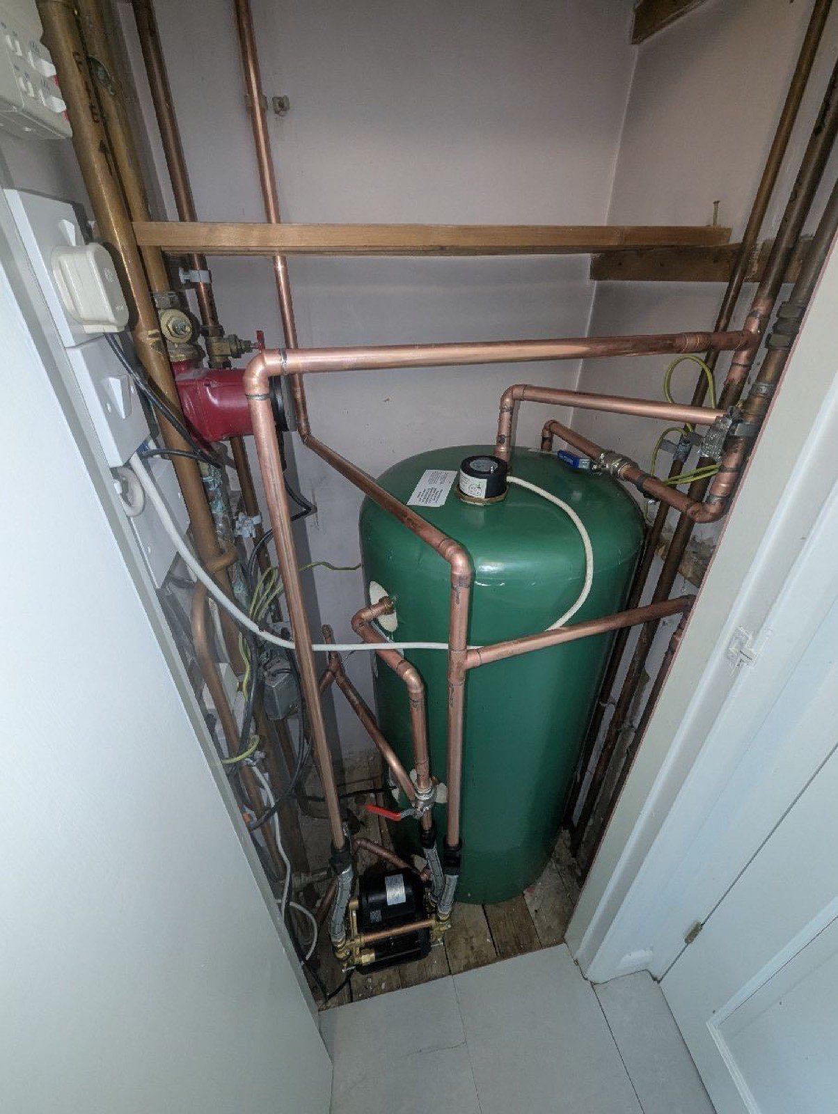 Hot water cylinder with new copper pipework installed by Plumbing Angels