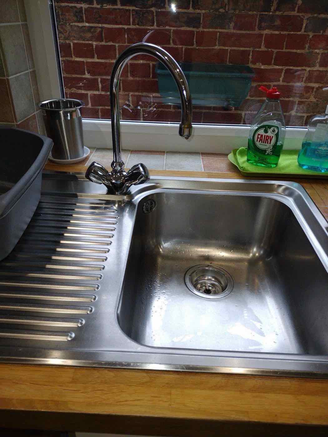 Kitchen sink and tap installation completed