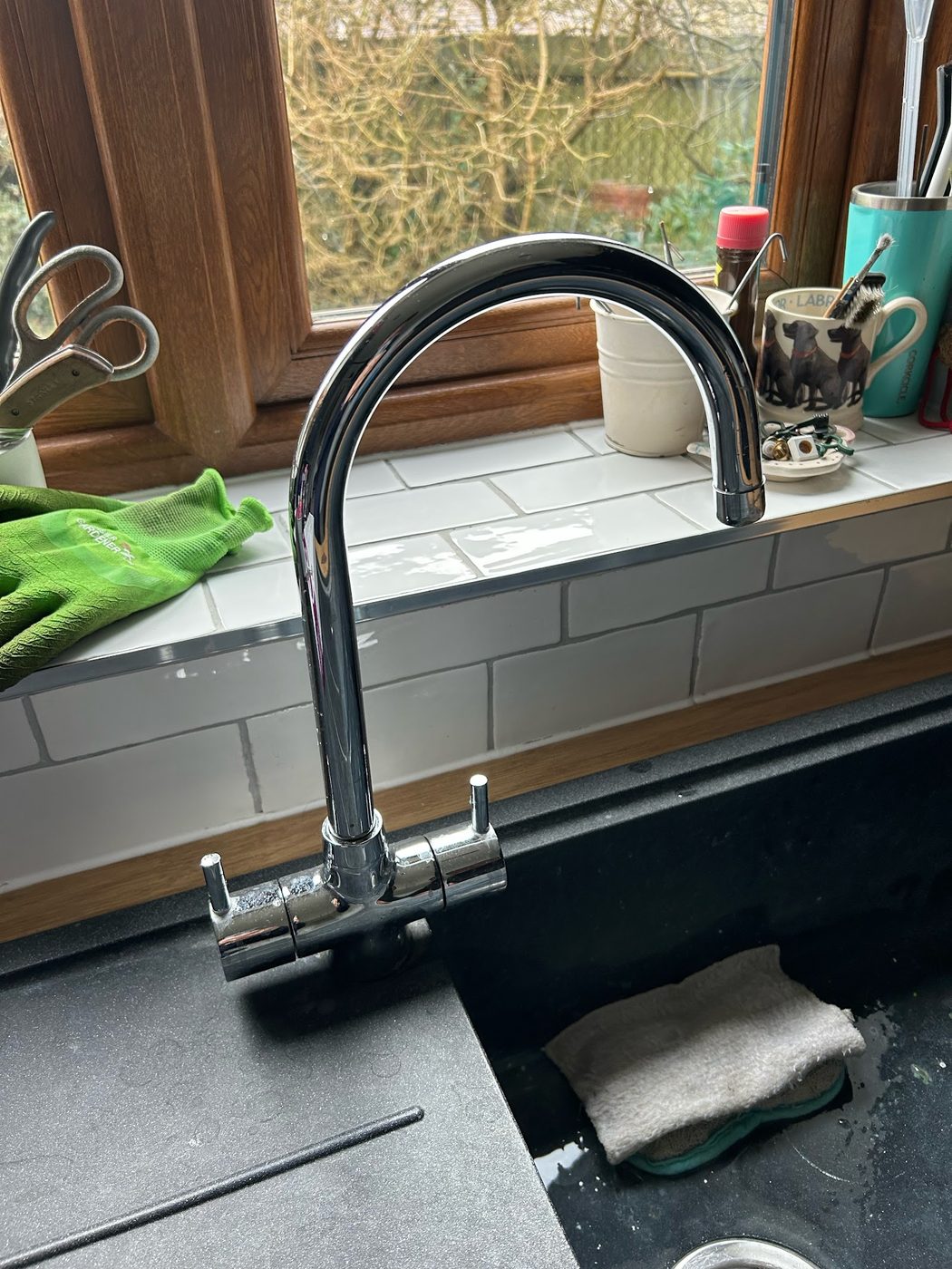 New chrome kitchen mixer tap fitted